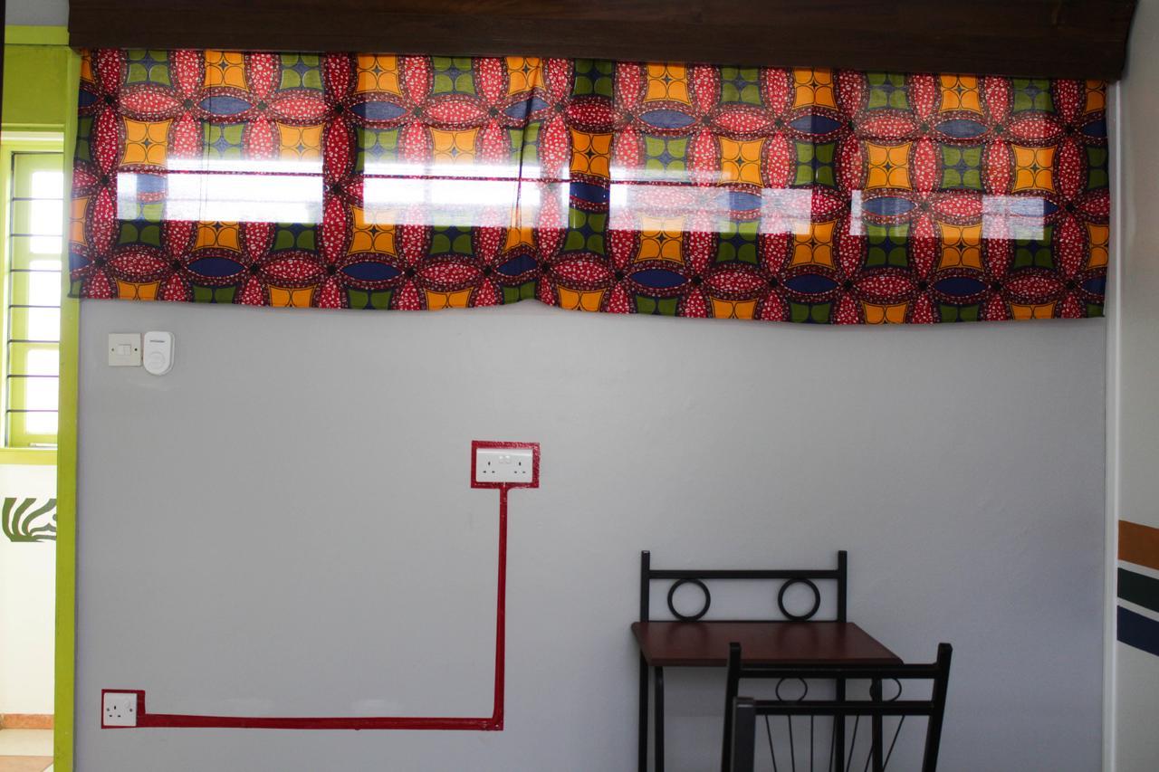 We Travel Hostel Moshi Buitenkant foto